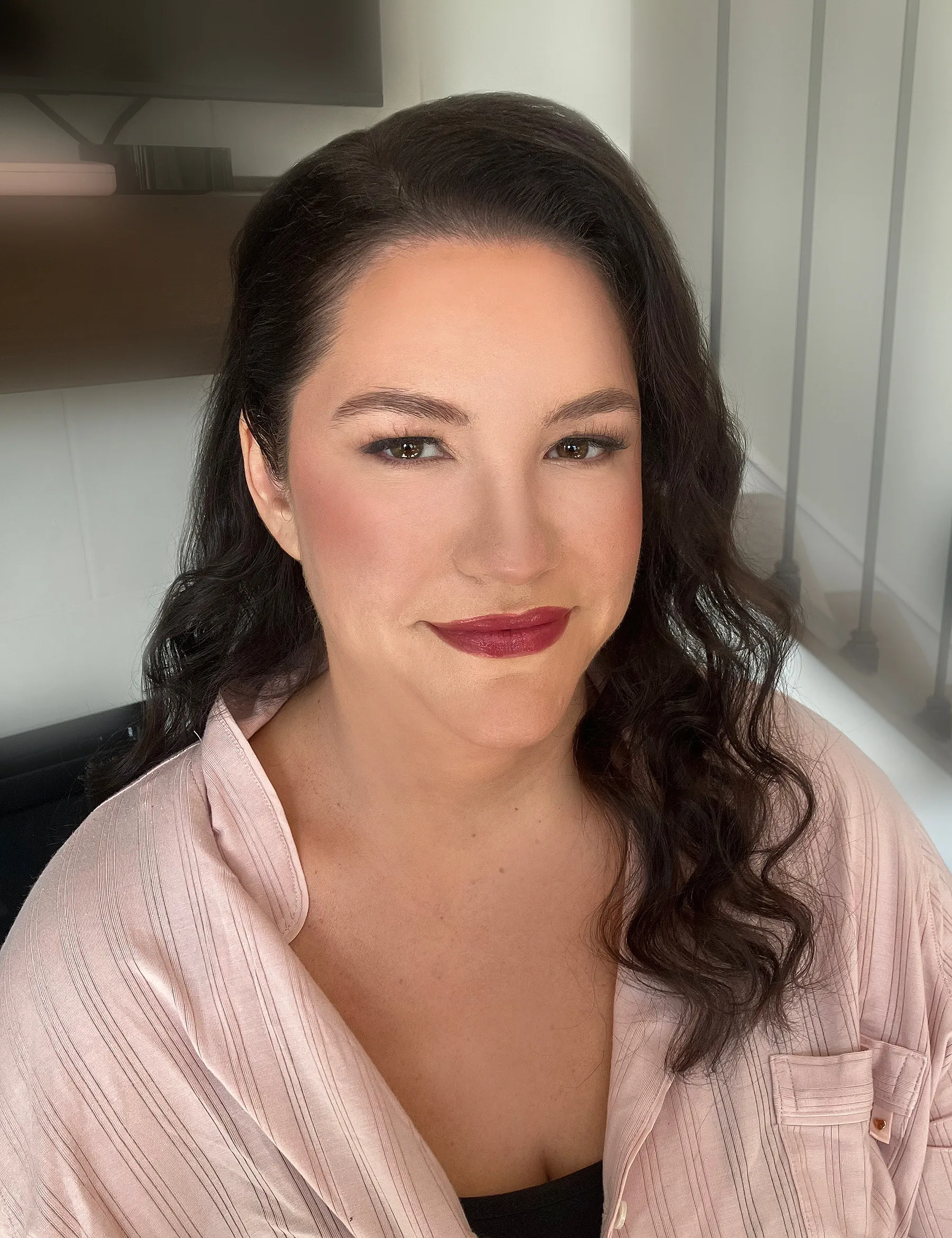 Bride getting ready with professional hair and makeup in Carmel, IN