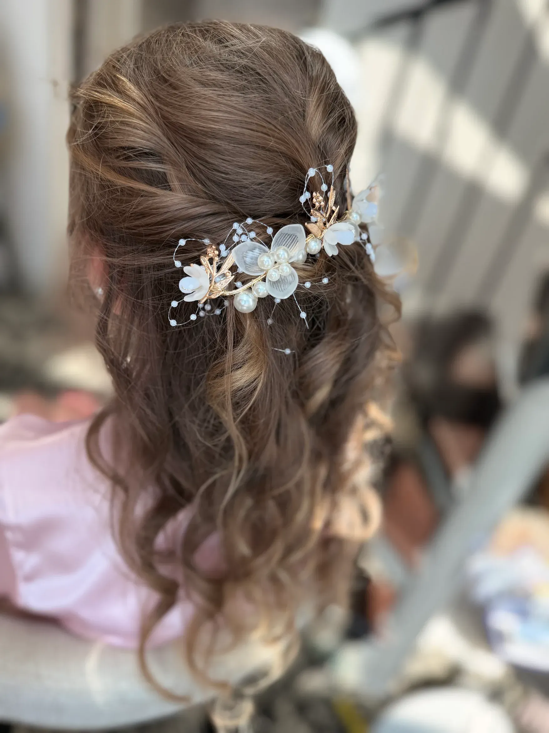 Bridal curls with pearl and floral hairpiece by Glow Salon & Spa